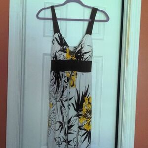 Sundress built in bra. Tie at waist in back.